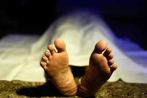 Dead body on floor Stock Photos