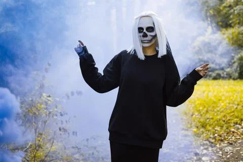 Dead bride is dancing in the middle of the forest. Stock Photos