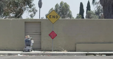 Dead end sign wind trees blowing in wind Stock Footage 138871304