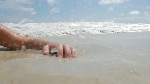Dead man on beach Stock Footage 94526562