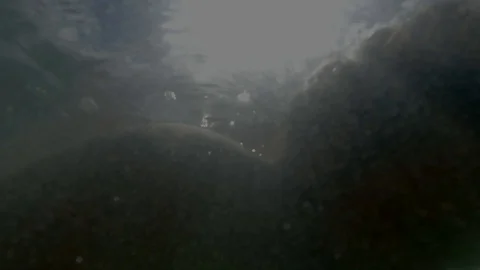 Dead Man floats in Ocean Stock Footage 94526589