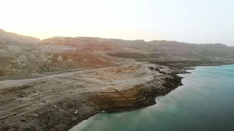 Dead sea drone view 4k flight over the salt lake looking at the road Stock Footage 170726304