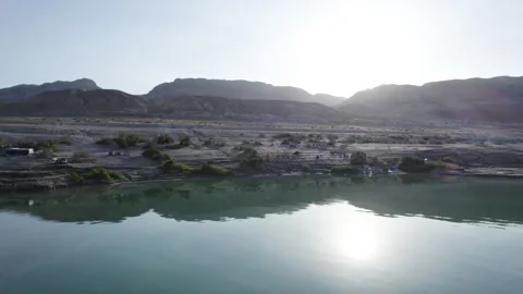 Dead Sea shore sunset front drone Stock Footage 247322405