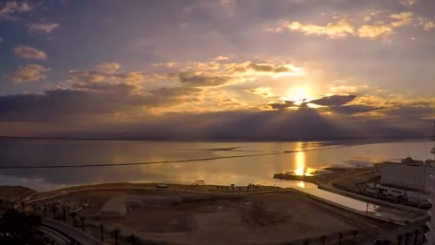 Dead Sea sunrise clouds time lapse; Israel Stock Footage 154028337