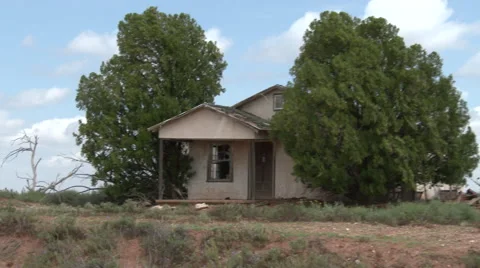 Dead trees, then pan to an abandoned home on the prairies of Texas, 4K. Stock Footage 67388679