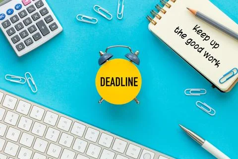 Deadline and Keep Up the Good Work. Conceptual words. Office accessories Stock Photos