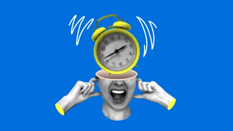 Deadline concept. Female head with an ringing alarm clock inside Stock Footage 329190257