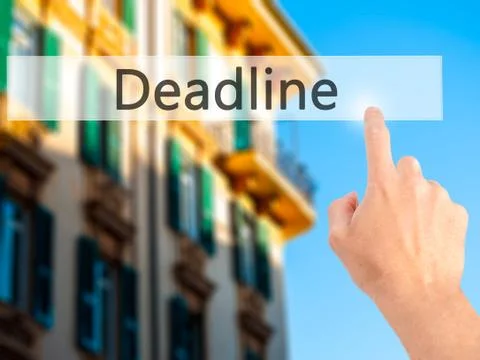 Deadline - Hand pressing a button on blurred background concept on visual scr Stock-Fotos