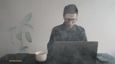Deadline pressure. Stressed man at her laptop feels the pressure of project Stock Footage 308960169