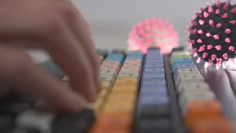 Deadly coronavirus on the keyboard Stock Footage 126912720