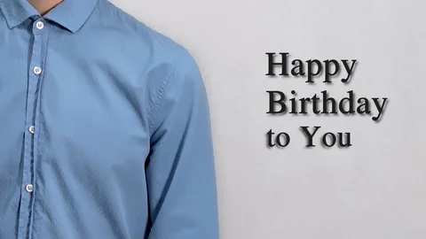 Deaf guy with Asian features in blue shirt on white background saying Happy  스톡 동영상 121451298