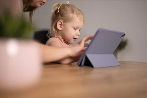 Deaf kid with hearing aid cochlear implant - Hear aid and medicine innovating Stock Photos
