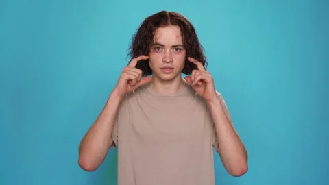 Deaf-mute Guy showing Phrase Please Put on Mask on American Sign Language Stock Footage 157886918