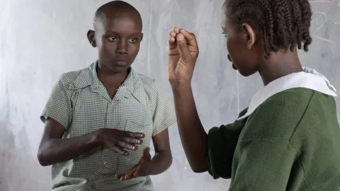 Deaf students using sign language. Kenya. Stock Footage 94955411