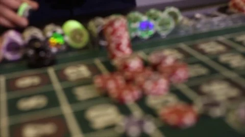 The dealer arranges chips on the table Video stock 83067773