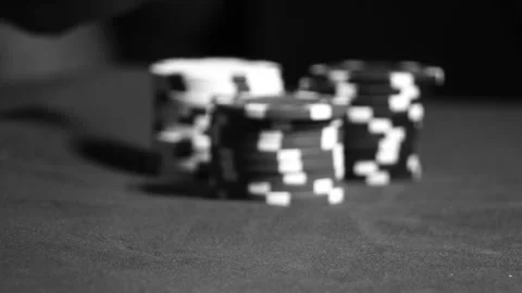 Dealer moves a stack of poker chips Stock Footage 248239271