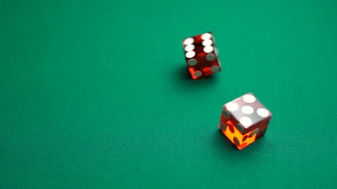 The dealer rolls ten in craps. Slow motion two red dice, craps Stock Footage 124824597