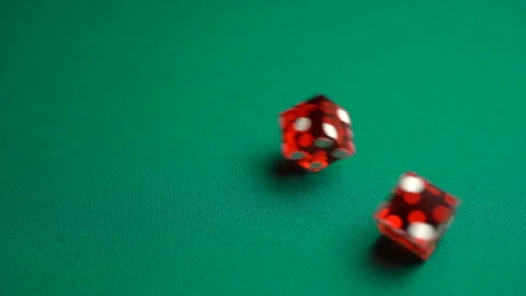 The dealer rolls twelve on dice. Slow motion two red dice, craps Stock Footage 124824152