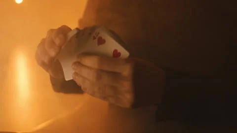 The dealer shuffles a deck of cards Stock Footage 141936769