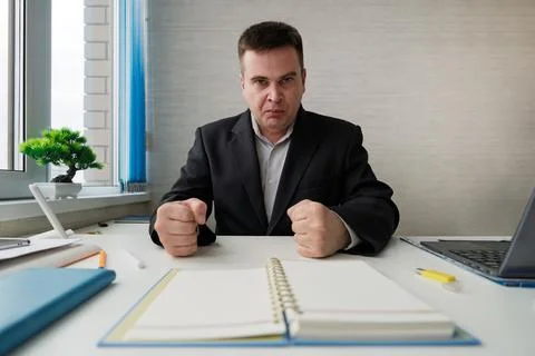 Dealing with anger at work. strict boss feel anger at work. Businessman show  Stock Photos