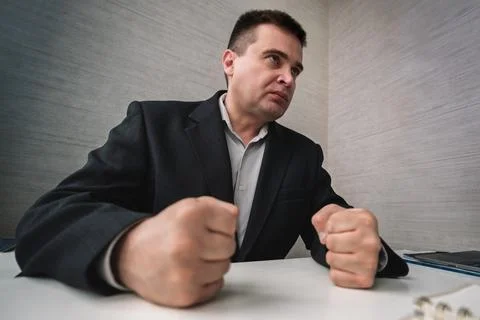 Dealing with anger at work. strict boss feel anger at work. Businessman show  Stock Photos