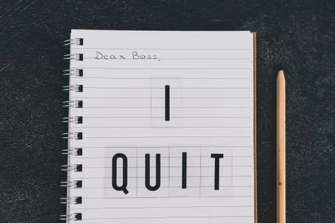 Dear boss I quit message on notebook Stock Photos