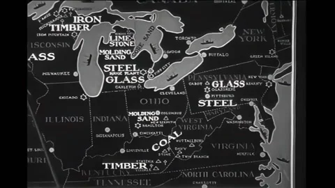 DEARBORN - 1930 - A worker uses a pointer to show the locations of Ford plants Stock Footage 308102464