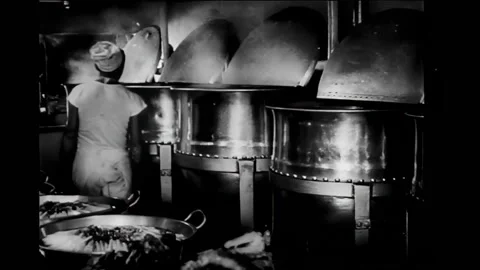 DEARBORN - 1945 - Sailors bake bread, prepare meals, wash decks, stand at Stock Footage 308101028