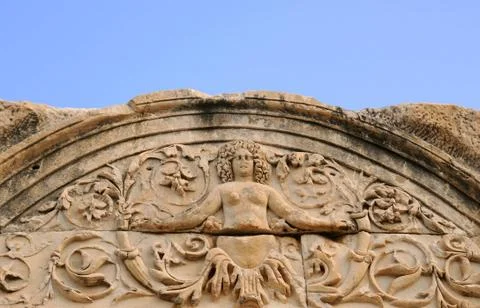 Deatail of the temple of hadrian Stock Photos