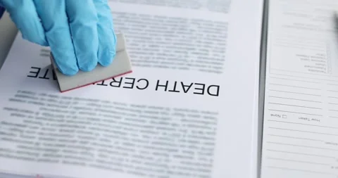 A Death Certificate Document with a Pen set on a Professional Desk for record Stock Footage 299295062