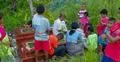 Death cult and silent worship on grassy jungle mountain hill in Indonesia Photo
