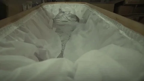  Death: Preparing the Coffin Stock Footage 128983989
