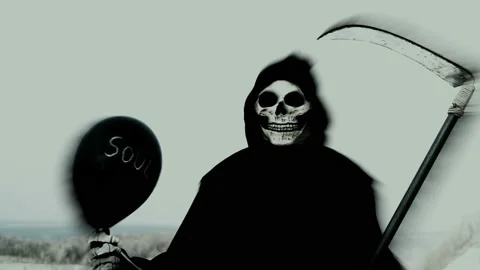 Death with a scythe holds a balloon, in whose imprisonment is someone's soul Stock Footage 97035107