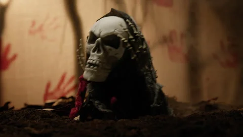 Death skull comes out of the ground Stock Footage 283471848