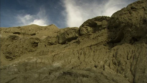 Death Valley cliffs with timelapse clouds and shadows Stock Footage 86943413