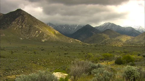 Death Valley mountains with dark clouds Stock Footage 87787746