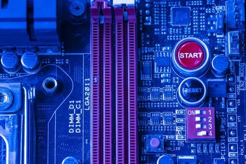  Deatil of Start and reset button inside a pc in blue lght Start and reset... Stock Photos