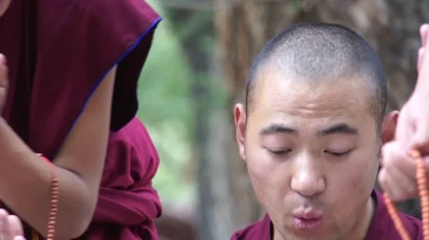 Debating and waving hands monks at Sera Monastery, Lhasa Stock Footage 44032559