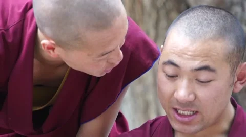 Debating and waving hands monks at Sera Monastery, Lhasa Stock Footage 44032679
