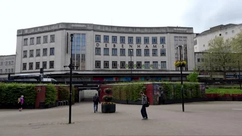 Debenhams Building from The Bearpit with traffic passing by Stock Footage 272986299