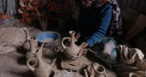 Debre Berhan Close up of Potter's hands work with clay in central Ethiopia Stock Footage 109172632