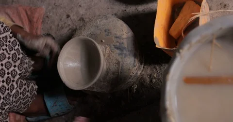 Debre Berhan Close up of Potter's hands work with clay in central Ethiopia Stock Footage 109172671