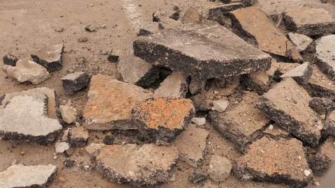 Debris and construction site debris and broken asphalt Stock Footage 102437147