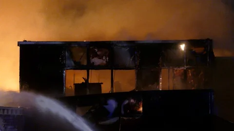 Debris and disarray is the feeling you get after seeing fire devastation Stock Footage 129987544