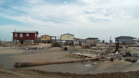 Debris and sand in flood-damaged residential area after a hurricane Stock Footage