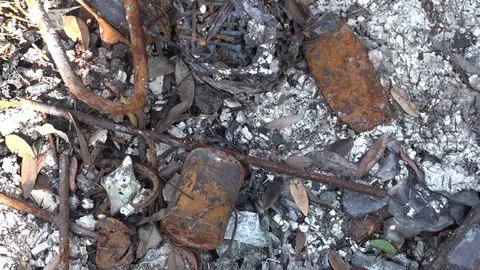 Debris in ash after fire Stock Footage 84625975
