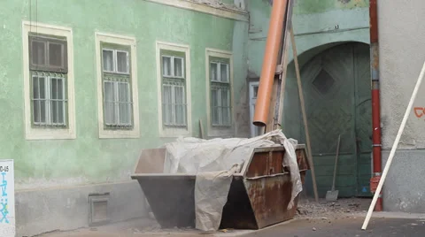 Debris Gutter to Dumpster Video stock 33269002