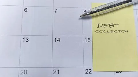 "Debt Collection" written on a sticky note positioned on a calendar, signif.. Stock Photos