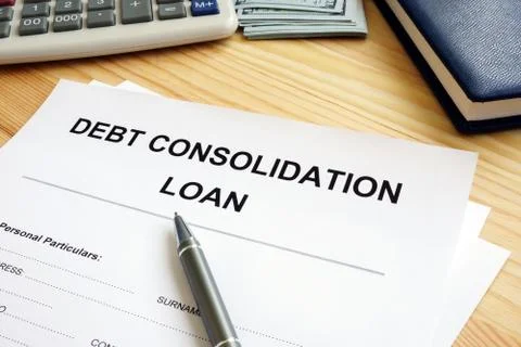 Debt consolidation loan concept. Stack of papers in the office. Stock Photos