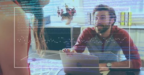 Debugging code woman in red blouse, raglan-shirted man at office desk with Foto stock